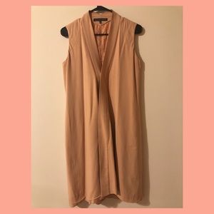 Nude sleeveless jacket